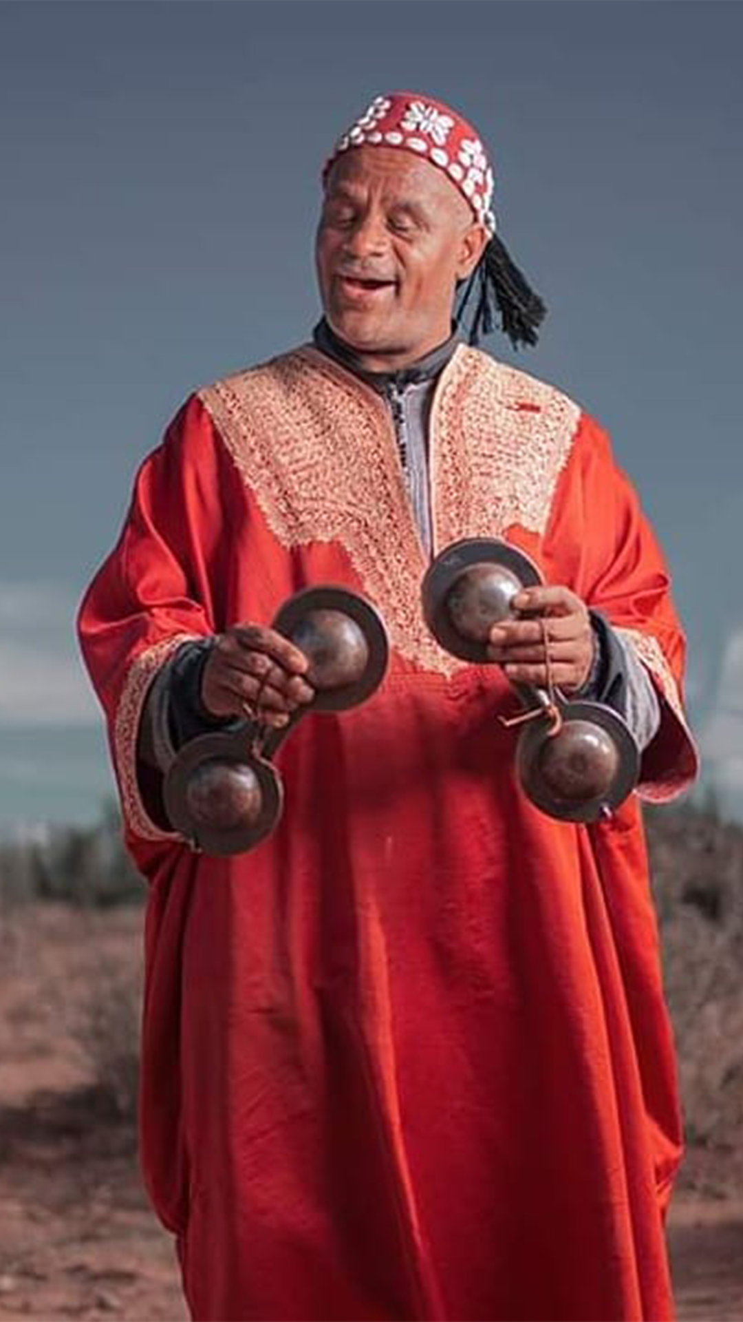 A spiritual Moroccan music born from African roots, echoing through the streets of Marrakech with deep bass, metal castanets, and trance-like energy