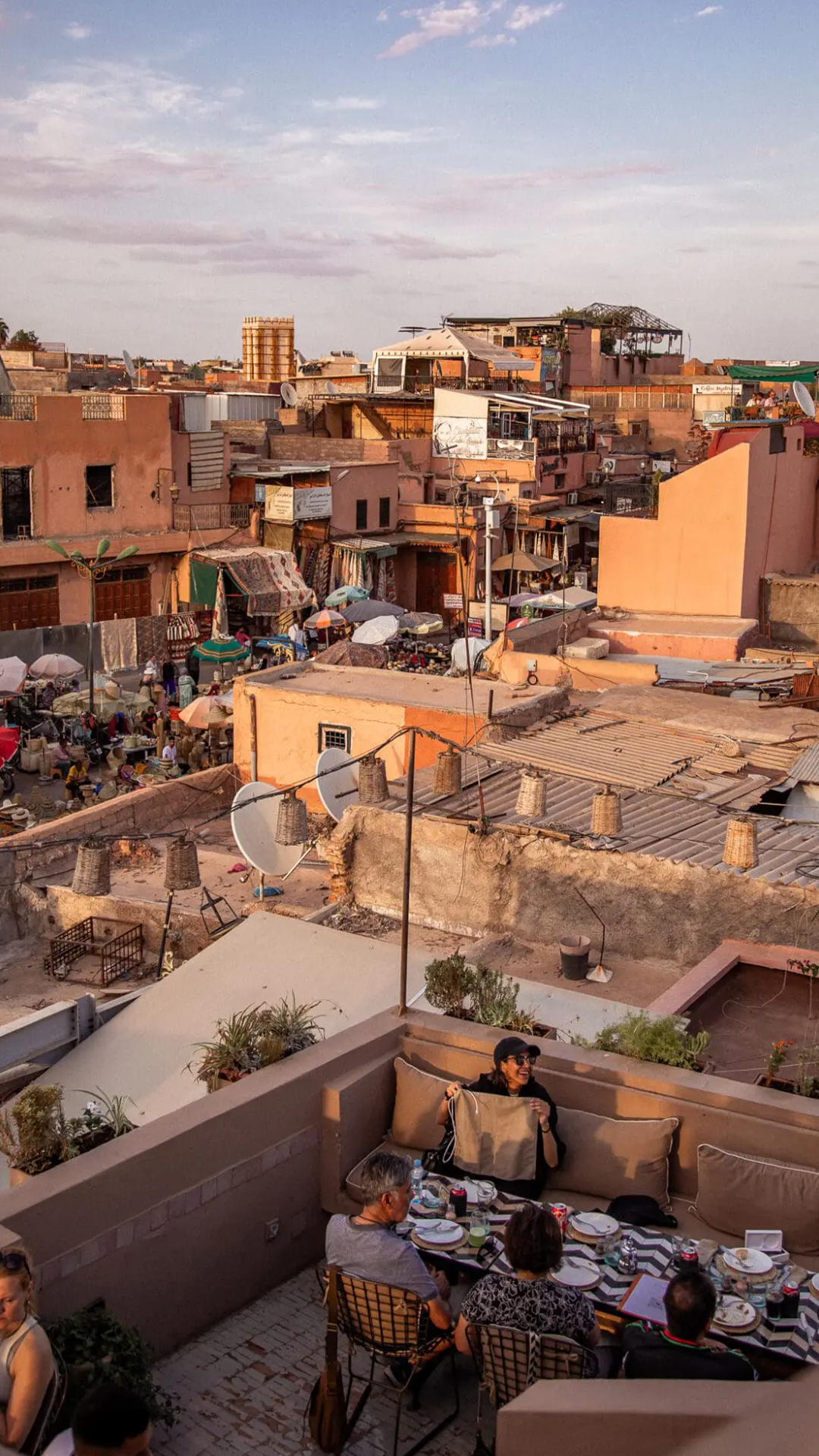 Above the buzz of the souks, Medina rooftops offer a new world — sunsets, mint tea, and sweeping views over the red city’s magic